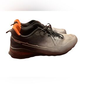 Black and Gray Athletic Shoes with Orange Accents